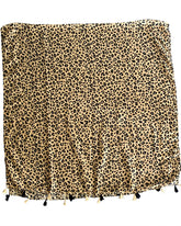 Elevate your style with our lightweight beige and black cheetah pattern scarf, perfect for all seasons. The bold cheetah print adds an edgy touch to any outfit, complemented by the neutral beige and black color combination that pairs effortlessly with various styles. Playful tassels on each end provide a fun accent, and the generous 185 x 90cm size allows for versatile styling options.